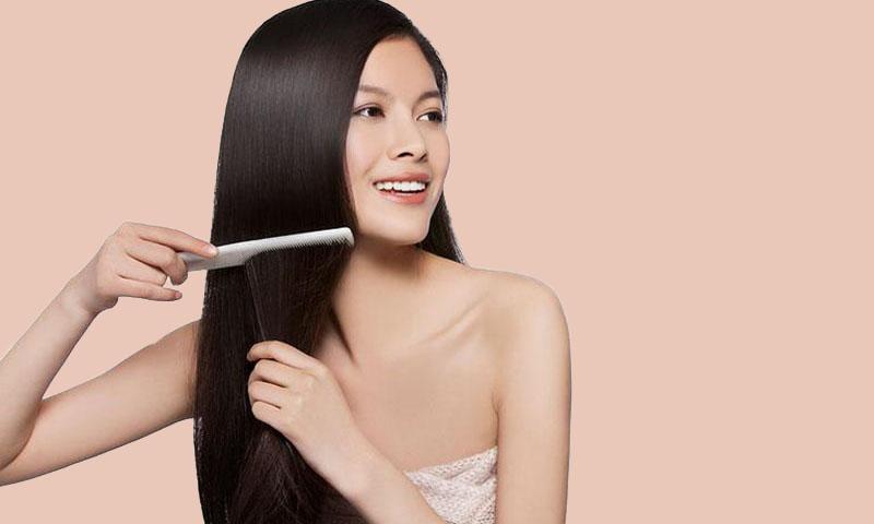 Dùng dầu xả trước, dầu gội sau giúp tóc mềm mượt như đi salon